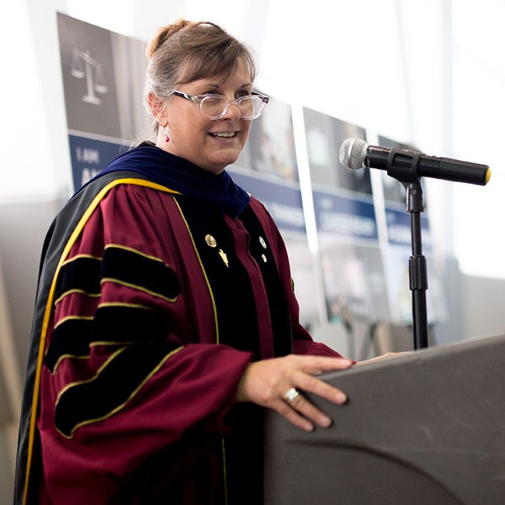 Dean Robbin Crabtree speaking at graduation