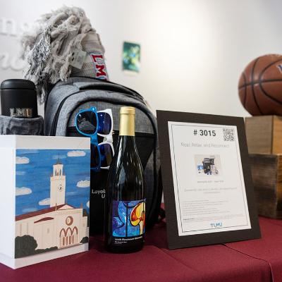 Items sitting on a table for a silent auction.