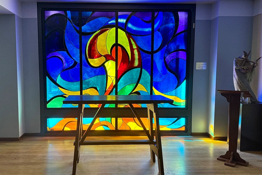 A stained glass window is seen in the Marymount Institute on LMU's campus.