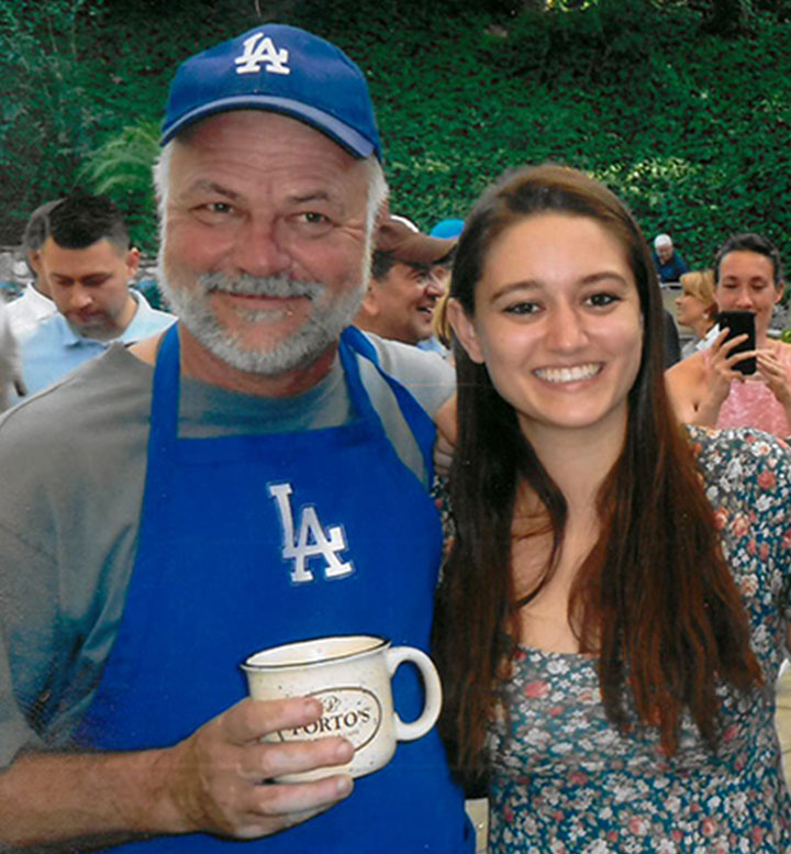 Ron Valenta ’80 with a member of his family, Haleigh Rose.
