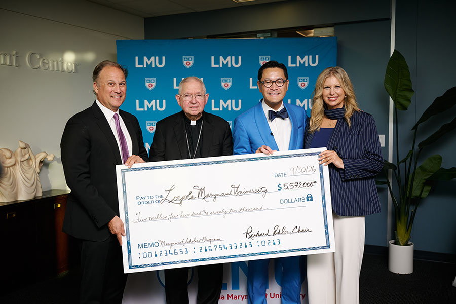 LMU President Thomas Poon, Ph.D., second from right, and Archbishop Jose Gomez, second from left, stand with representatives from the Marymount Education Foundation, holding a large check for $5.57M marking the largest contribution to the LMU Promise Program and representing a transformative investment in creating accessible pathways to higher education for local students.
