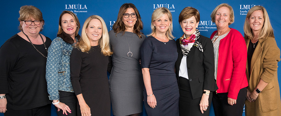 Founding members standing with Gretchen Carlson