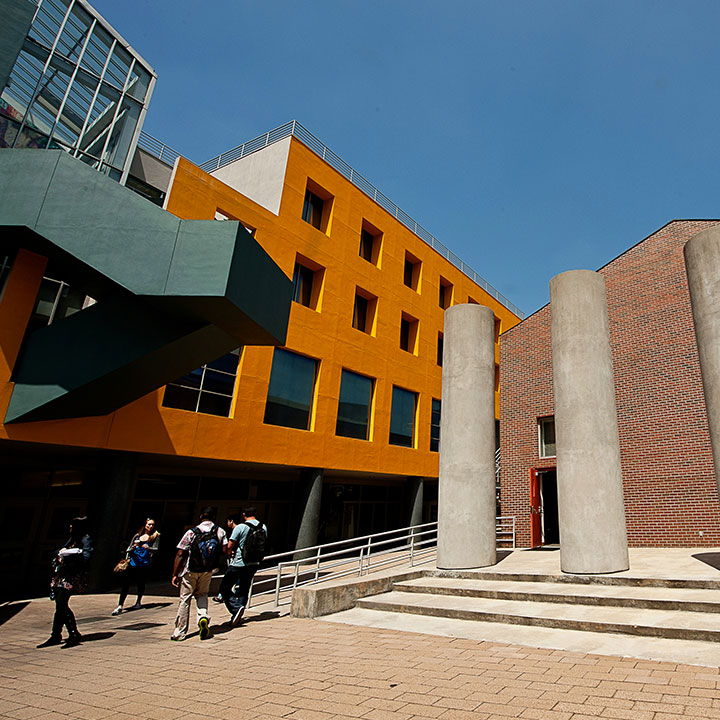 The Burns building on the LMU Loyola Law School campus with students in the foreground.
