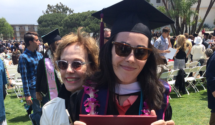 A student with her mother at graduation