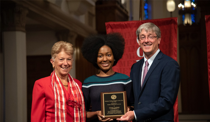Elena Bove, Senior Vice President for Student Affairs, and LMU President Timothy Law Snyder, Ph.D., with a Black student award winner.