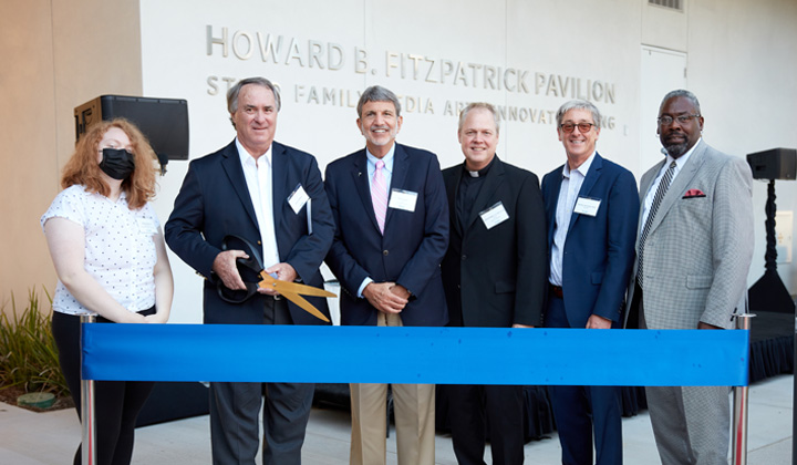 The ribbon is cut to open the Howard B. Fitzpatrick Pavilion at the LMU School of Film and Television